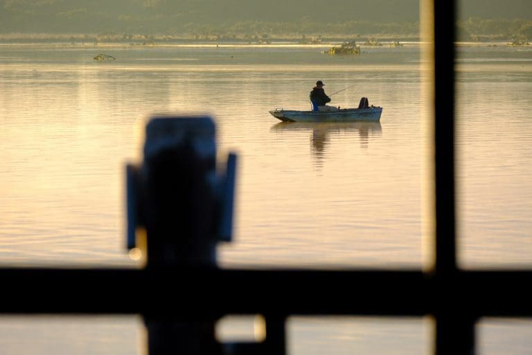 Shoalhaven Heads sunrise and a fisherman on the Shoalhaven River